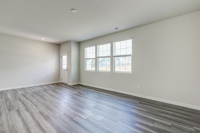 210 Wakelon Dr, Greer, SC 29651 - unfurnished room featuring wood finished floors and recessed lighting