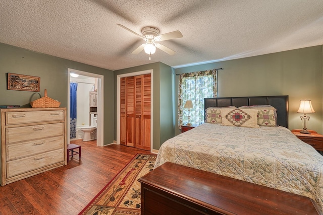 1212 Riveroak Rd, Inman, SC 29349 - bedroom featuring wood finished floors, a textured ceiling, a closet, connected bathroom, and ceiling fan