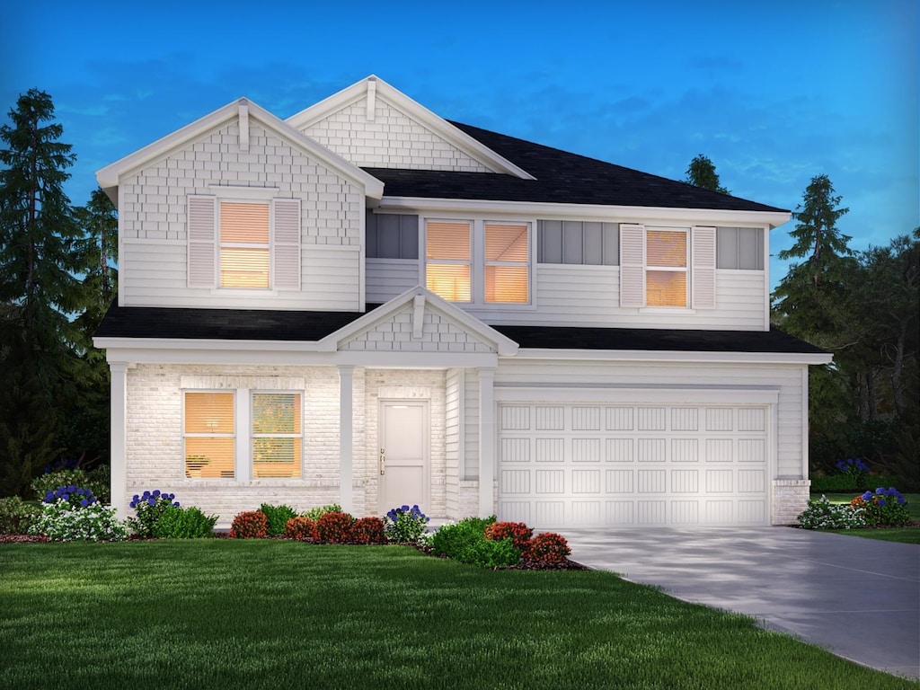 202 Granby Trl, Easley, SC 29642 - view of front facade with an attached garage, driveway, a front yard, and brick siding