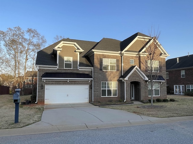 499 Gorham Dr, Boiling Springs, SC 29316 - view of front of home featuring concrete driveway, brick siding, and an attached garage