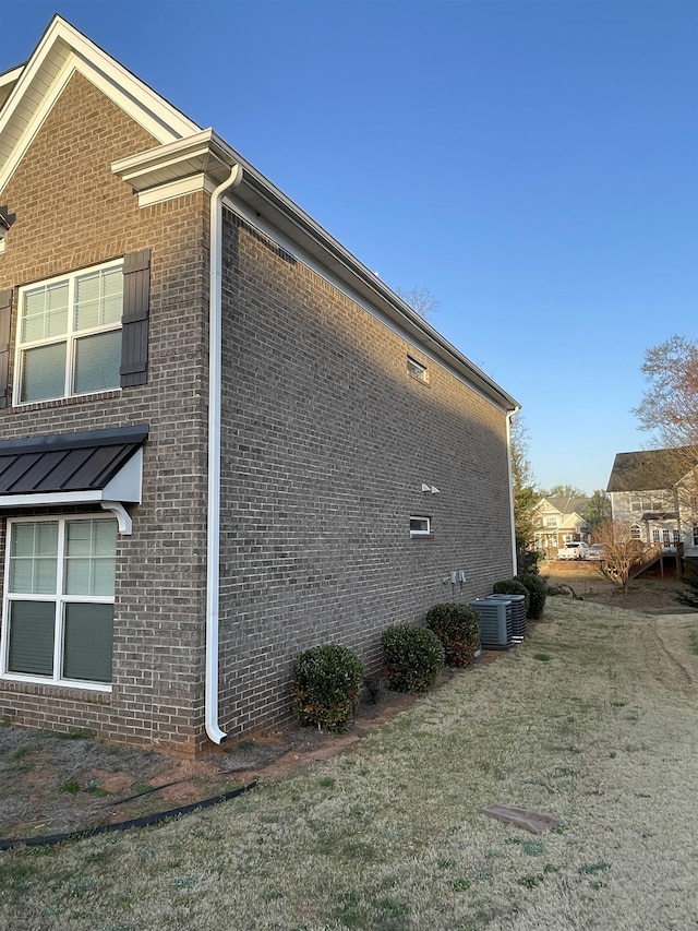 499 Gorham Dr, Boiling Springs, SC 29316 - view of side of home featuring brick siding and a central AC unit