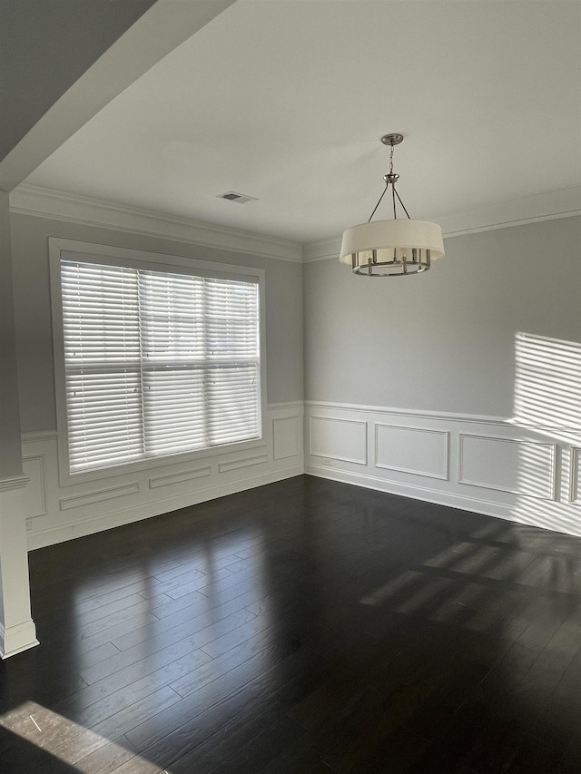 499 Gorham Dr, Boiling Springs, SC 29316 - unfurnished dining area with ornamental molding, dark wood-style floors, a wainscoted wall, and a decorative wall