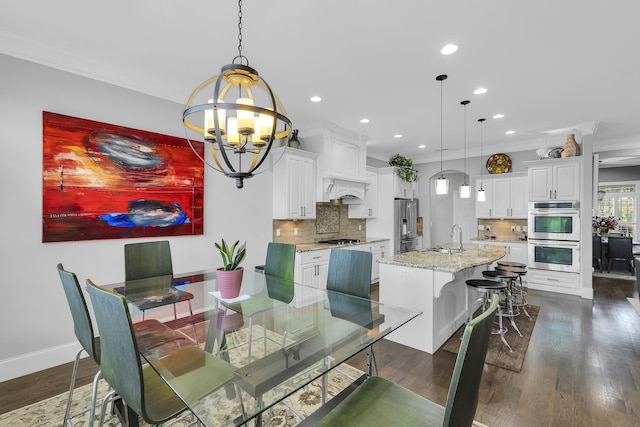 498 Double Bridge Rd, Boiling Springs, SC 29316 - dining area featuring a chandelier, recessed lighting, dark wood finished floors, and ornamental molding