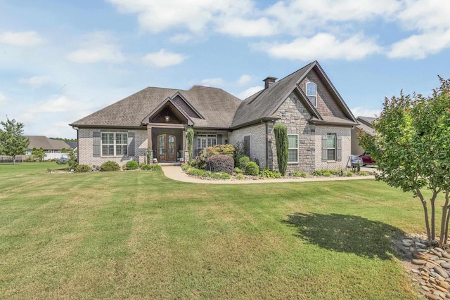 498 Double Bridge Rd, Boiling Springs, SC 29316 - craftsman-style house with a front lawn, a chimney, brick siding, and french doors
