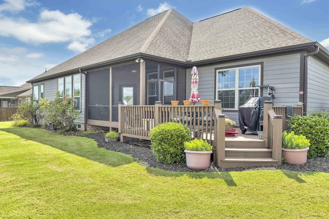 498 Double Bridge Rd, Boiling Springs, SC 29316 - rear view of house featuring roof with shingles, a wooden deck, a lawn, and a sunroom