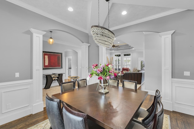 498 Double Bridge Rd, Boiling Springs, SC 29316 - dining area with decorative columns, arched walkways, ornamental molding, dark wood-type flooring, and wainscoting