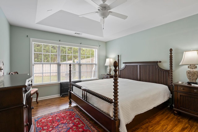 413 Pierview Way, Boiling Springs, SC 29316 - bedroom with dark wood-type flooring, a tray ceiling, and a ceiling fan