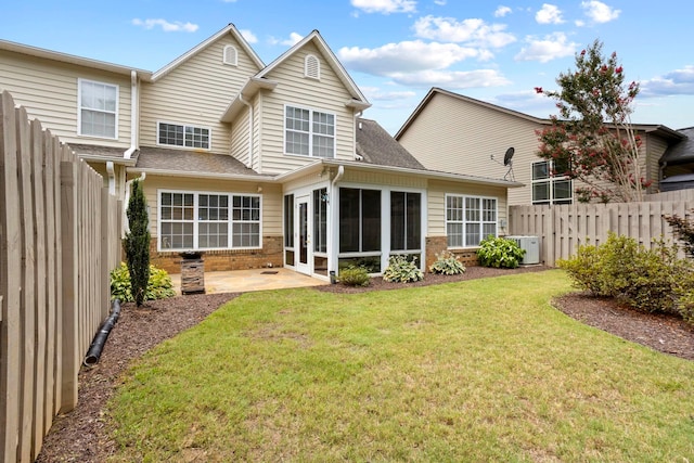 413 Pierview Way, Boiling Springs, SC 29316 - rear view of house featuring brick siding, a patio area, a sunroom, a fenced backyard, and a shingled roof