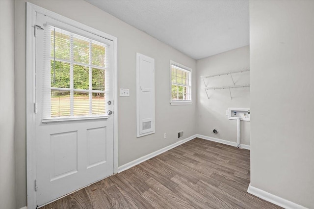 251 Winfield Dr, Spartanburg, SC 29307 - laundry room with hookup for a washing machine, wood finished floors, and electric dryer hookup