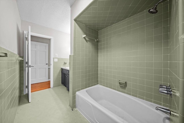 251 Winfield Dr, Spartanburg, SC 29307 - full bathroom featuring tile walls, vanity,  shower combination, and wainscoting