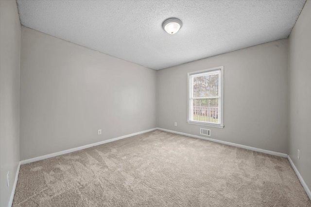 251 Winfield Dr, Spartanburg, SC 29307 - carpeted spare room featuring baseboards and a textured ceiling