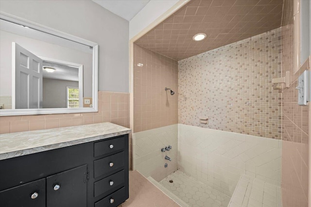 251 Winfield Dr, Spartanburg, SC 29307 - bathroom featuring tile walls, a tile shower, and vanity