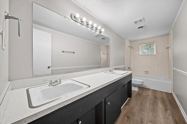 251 Winfield Dr, Spartanburg, SC 29307 - bathroom featuring double vanity, wood finished floors, and washtub / shower combination