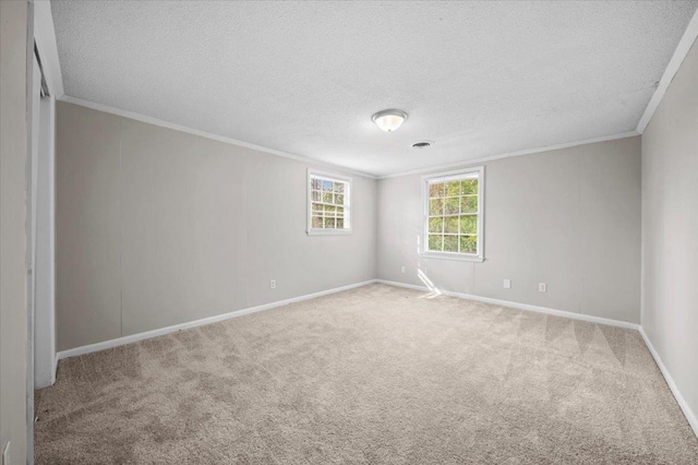 251 Winfield Dr, Spartanburg, SC 29307 - spare room featuring crown molding, a textured ceiling, and light carpet