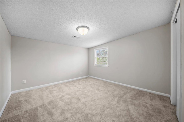 251 Winfield Dr, Spartanburg, SC 29307 - empty room featuring carpet floors and a textured ceiling
