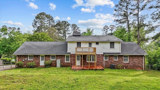 251 Winfield Dr, Spartanburg, SC 29307 - back of house with a fenced backyard, a chimney, a wooden deck, and brick siding