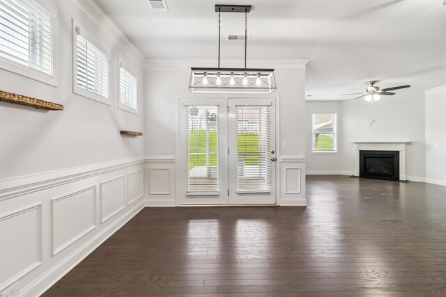 881 Deepwood Ct, Boiling Springs, SC 29316 - doorway with ornamental molding, a wainscoted wall, a ceiling fan, a decorative wall, and a fireplace with flush hearth