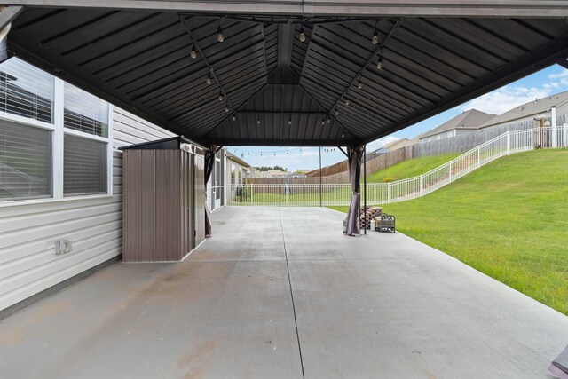 881 Deepwood Ct, Boiling Springs, SC 29316 - fenced backyard with a patio, a carport, and a gazebo