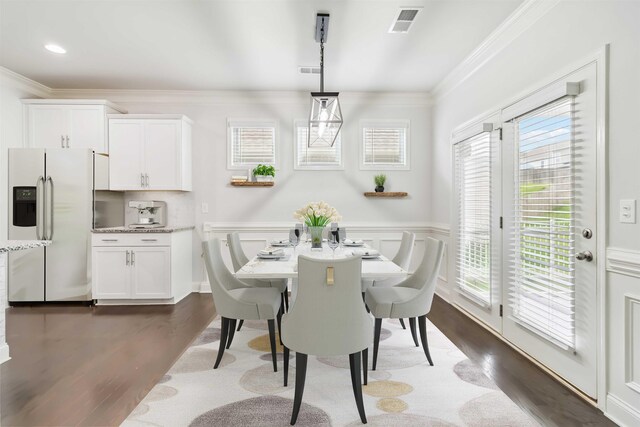 881 Deepwood Ct, Boiling Springs, SC 29316 - dining room with ornamental molding, dark wood-type flooring, and wainscoting
