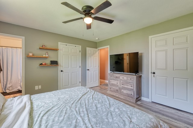 703 Patriot Ln, Greer, SC 29651 - bedroom featuring wood finished floors, ceiling fan, and ensuite bathroom