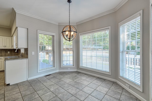 95 Roscommon Run, Moore, SC 29369 - unfurnished dining area with crown molding, plenty of natural light, and a chandelier
