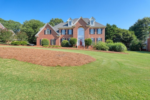 95 Roscommon Run, Moore, SC 29369 - colonial-style house featuring brick siding and a front lawn