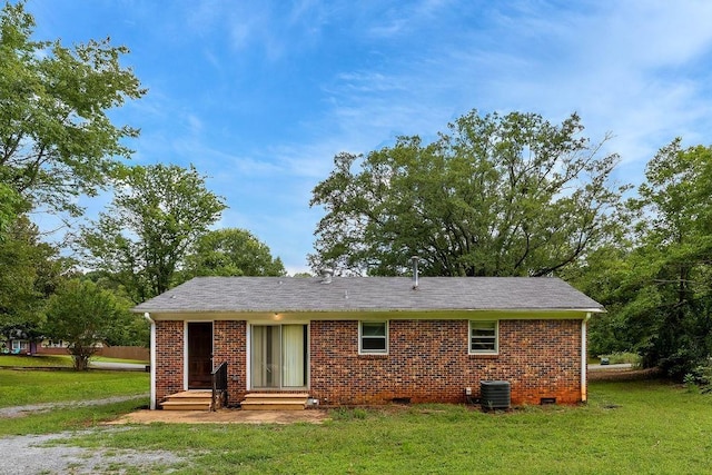 210 Catawba St, Union, SC 29379 - rear view of house with a yard, brick siding, and crawl space