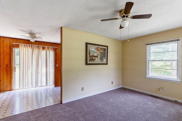 210 Catawba St, Union, SC 29379 - empty room with a ceiling fan, plenty of natural light, a textured ceiling, and carpet floors