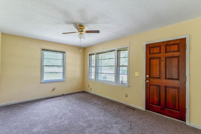210 Catawba St, Union, SC 29379 - carpeted foyer entrance featuring a ceiling fan and a textured ceiling