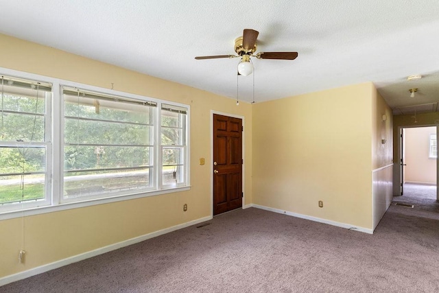210 Catawba St, Union, SC 29379 - unfurnished room with carpet floors, attic access, and a ceiling fan