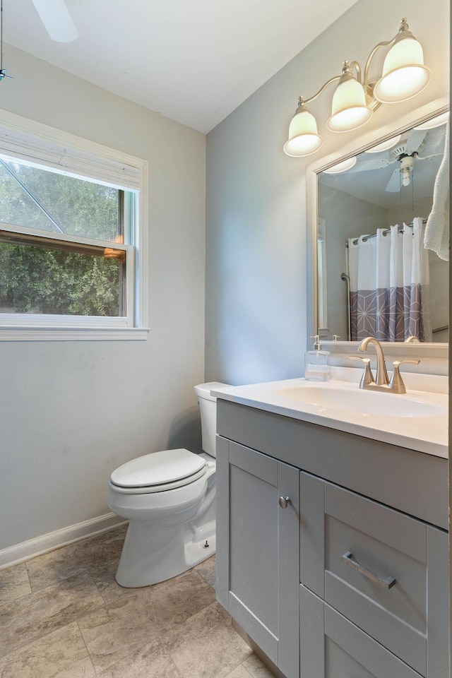 210 Catawba St, Union, SC 29379 - full bath with a ceiling fan, vanity, and curtained shower