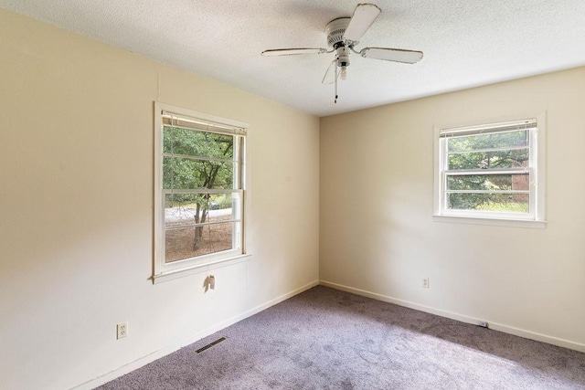210 Catawba St, Union, SC 29379 - unfurnished room featuring carpet floors, a ceiling fan, and a textured ceiling