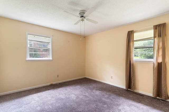 210 Catawba St, Union, SC 29379 - spare room featuring ceiling fan, carpet, and a textured ceiling