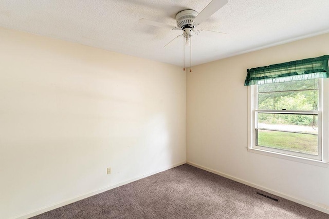 210 Catawba St, Union, SC 29379 - carpeted spare room featuring a ceiling fan and a textured ceiling