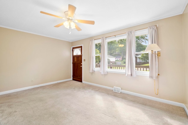 114 W Carolina St, Duncan, SC 29344 - foyer with carpet floors, ceiling fan, and ornamental molding