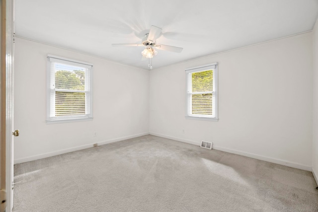114 W Carolina St, Duncan, SC 29344 - empty room with crown molding, ceiling fan, and carpet