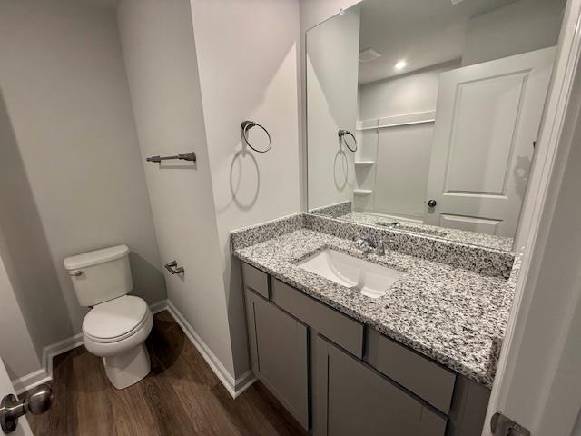 1236 Forestbrook Ln, Spartanburg, SC 29303 - bathroom with wood finished floors and vanity