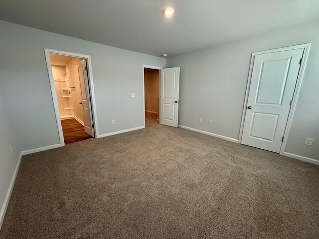 1236 Forestbrook Ln, Spartanburg, SC 29303 - unfurnished bedroom featuring carpet and ensuite bath