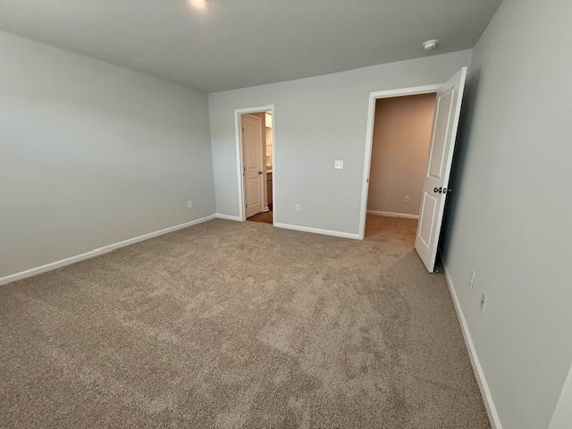 1236 Forestbrook Ln, Spartanburg, SC 29303 - unfurnished bedroom featuring carpet floors and baseboards