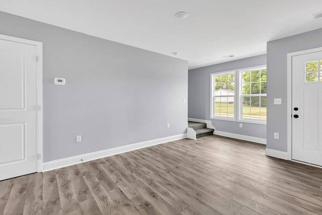 938 Logan St, Spartanburg, SC 29306 - entryway featuring stairs and wood finished floors