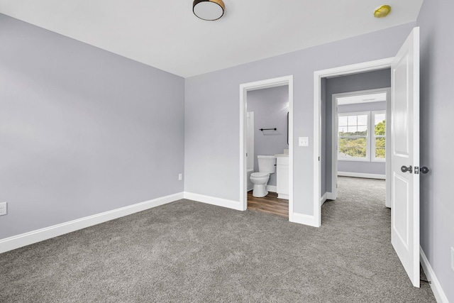 938 Logan St, Spartanburg, SC 29306 - unfurnished bedroom featuring carpet flooring and connected bathroom