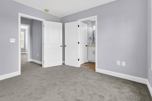 938 Logan St, Spartanburg, SC 29306 - unfurnished bedroom with carpet and connected bathroom