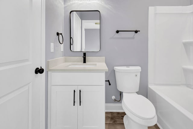 938 Logan St, Spartanburg, SC 29306 - full bath with vanity, wood finished floors, and bathtub / shower combination