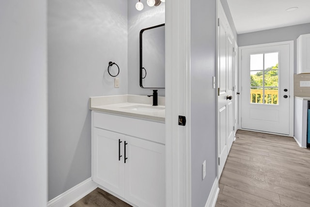 938 Logan St, Spartanburg, SC 29306 - bathroom with vanity and wood finished floors