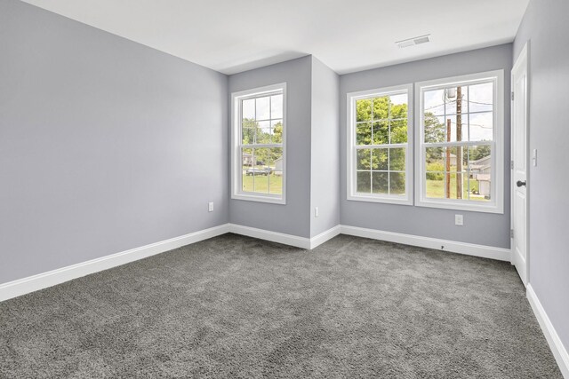 938 Logan St, Spartanburg, SC 29306 - unfurnished room with dark carpet