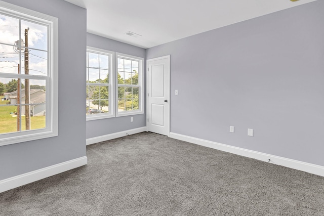 938 Logan St, Spartanburg, SC 29306 - carpeted empty room featuring baseboards