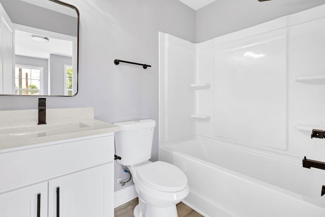 938 Logan St, Spartanburg, SC 29306 - bathroom with vanity, wood finished floors, and bathing tub / shower combination