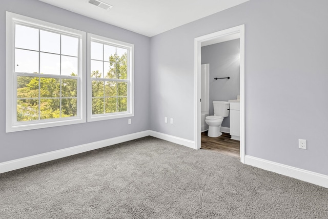 938 Logan St, Spartanburg, SC 29306 - unfurnished bedroom with carpet and ensuite bath