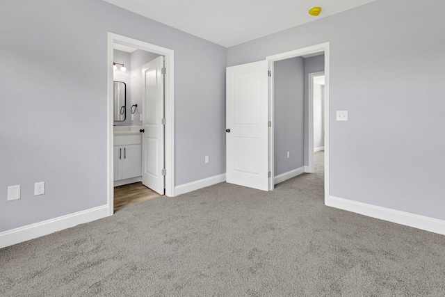 938 Logan St, Spartanburg, SC 29306 - unfurnished bedroom with carpet and baseboards