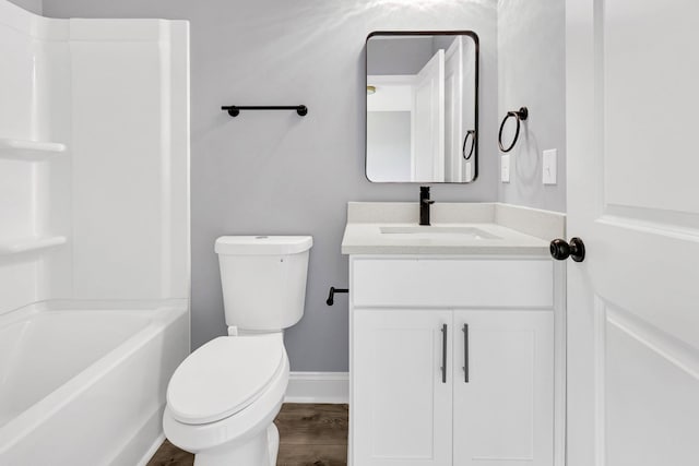 938 Logan St, Spartanburg, SC 29306 - bathroom with vanity, wood finished floors, and  shower combination